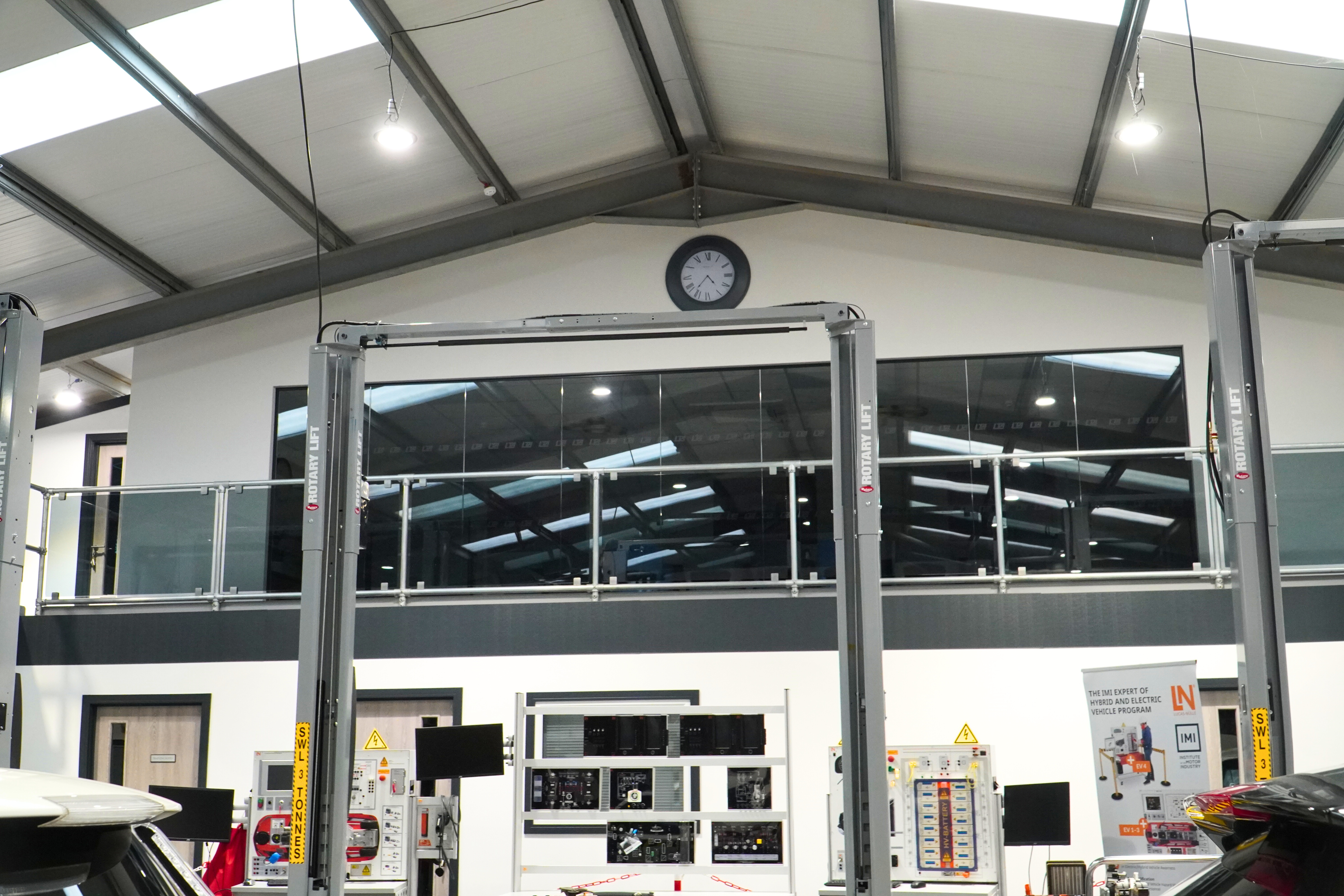 Inside an EV training centre looking up at the board room.