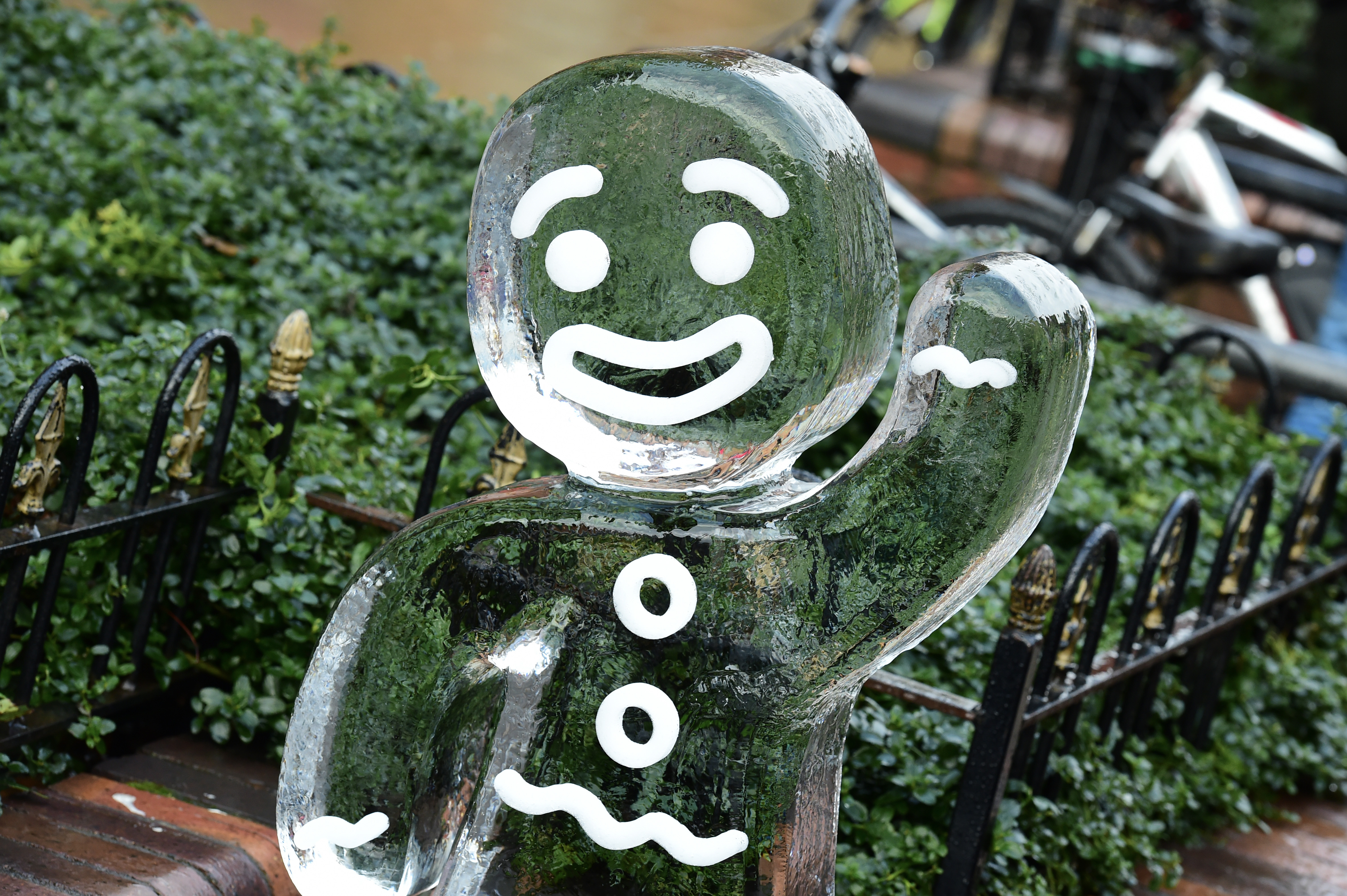 A photo of a gingerbread man ice sculpture