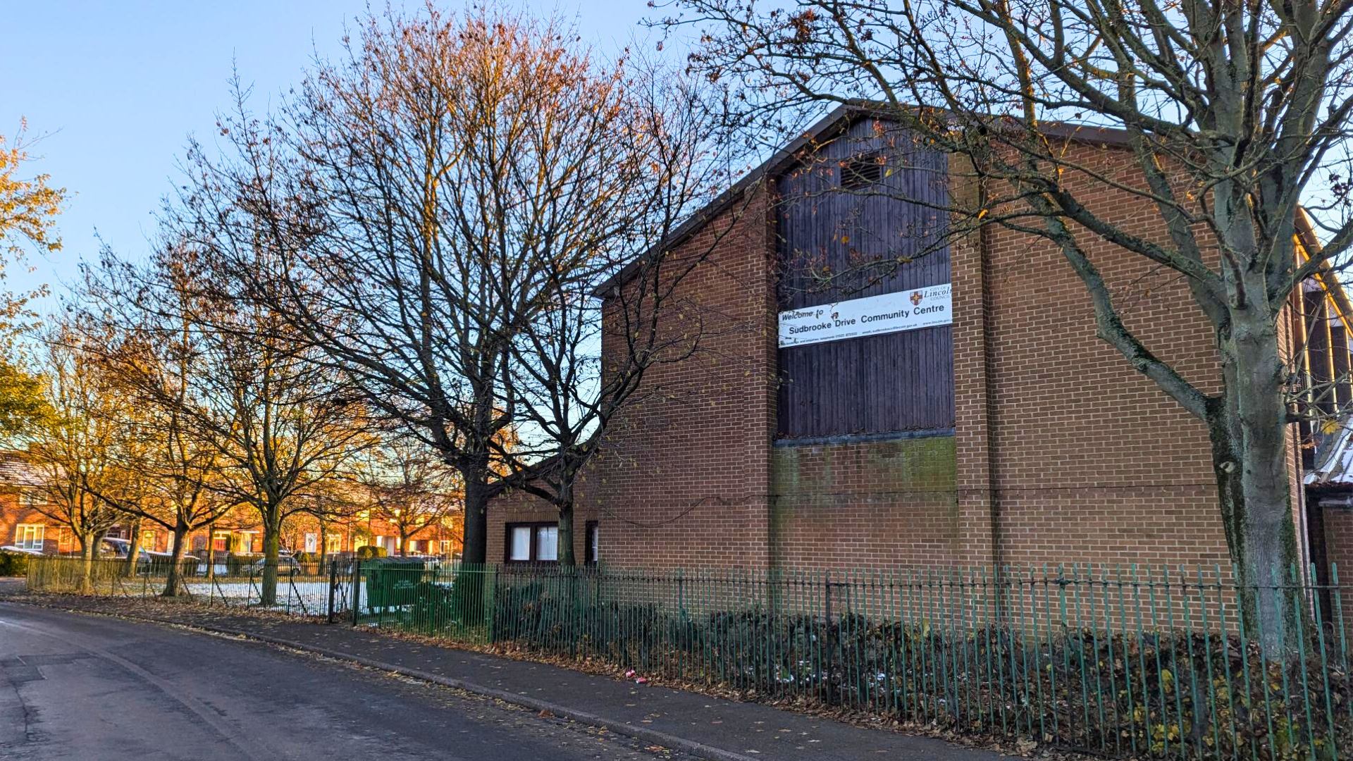 An external photo of a brick wall of Sudbrooke Drive Community Centre.