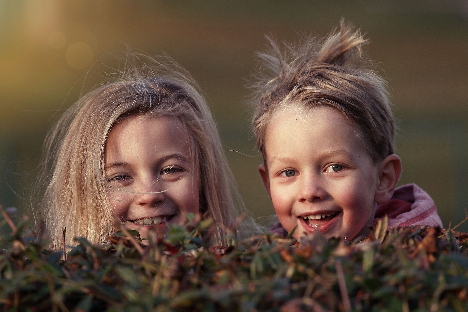 Two children playing outdoors